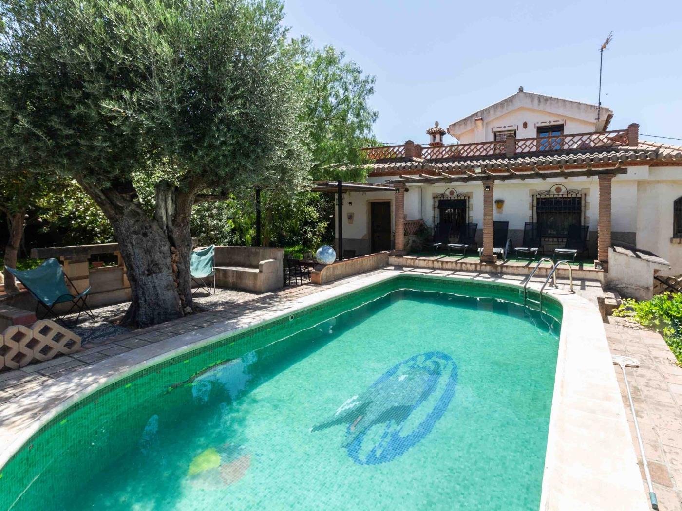 Bonita casa con piscina privada y terraza en Nigüelas