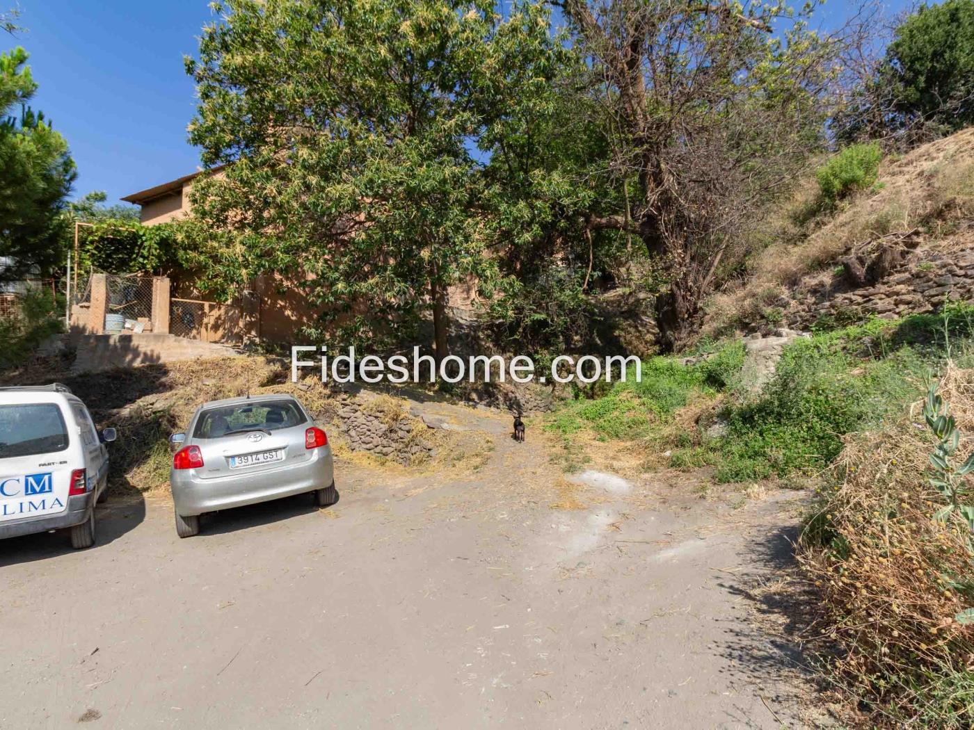 Cortijo con finca de regadío y vistas en Lanjarón en Lanjarón